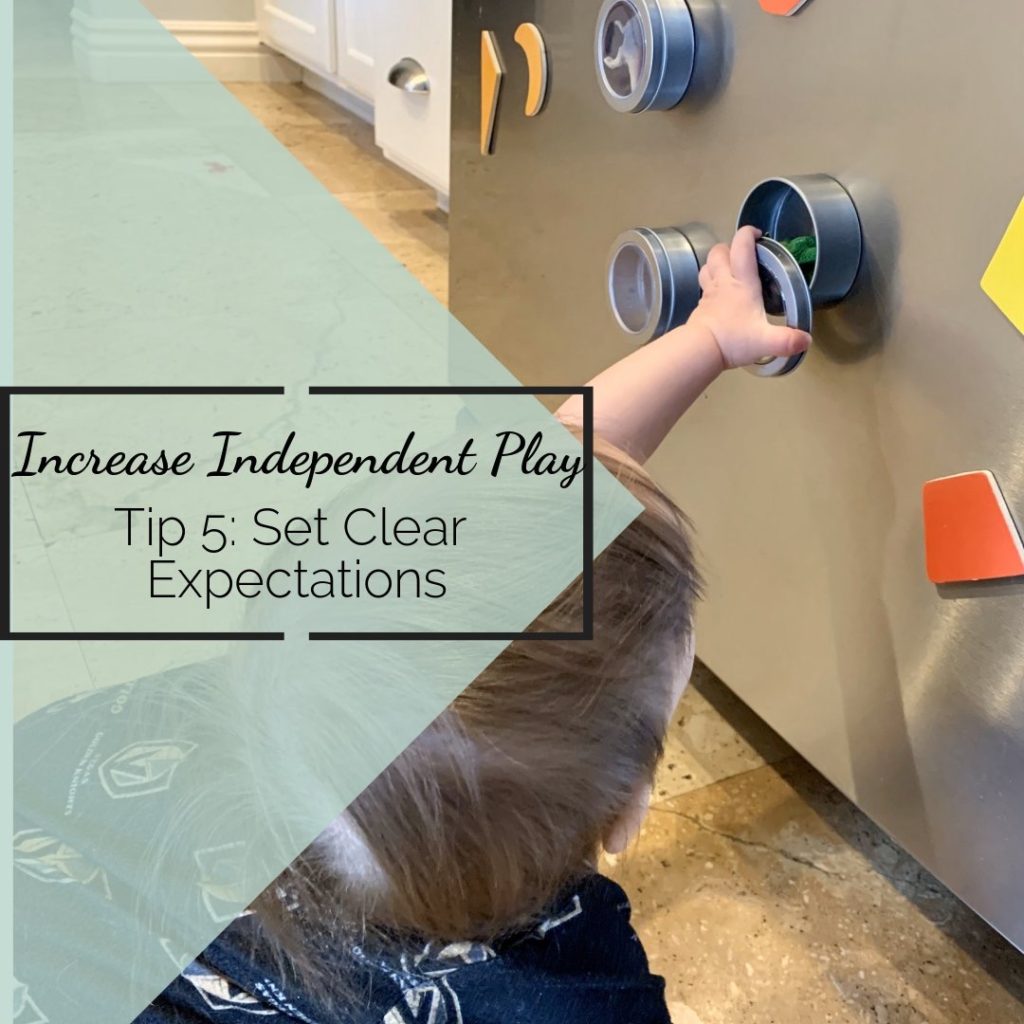 increase independent play tip 5 set clear expectations baby playing with magnet on fridge