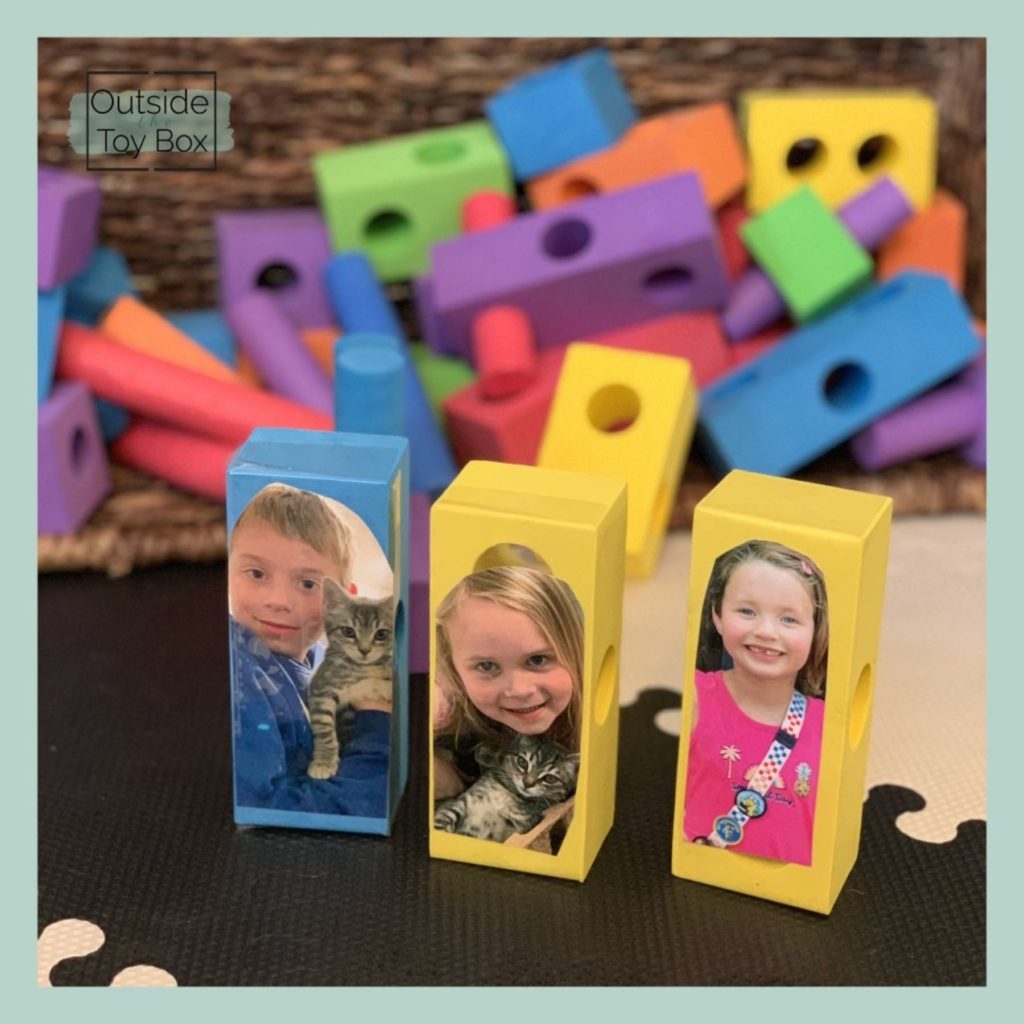 Kid pictures taped on foam blocks
