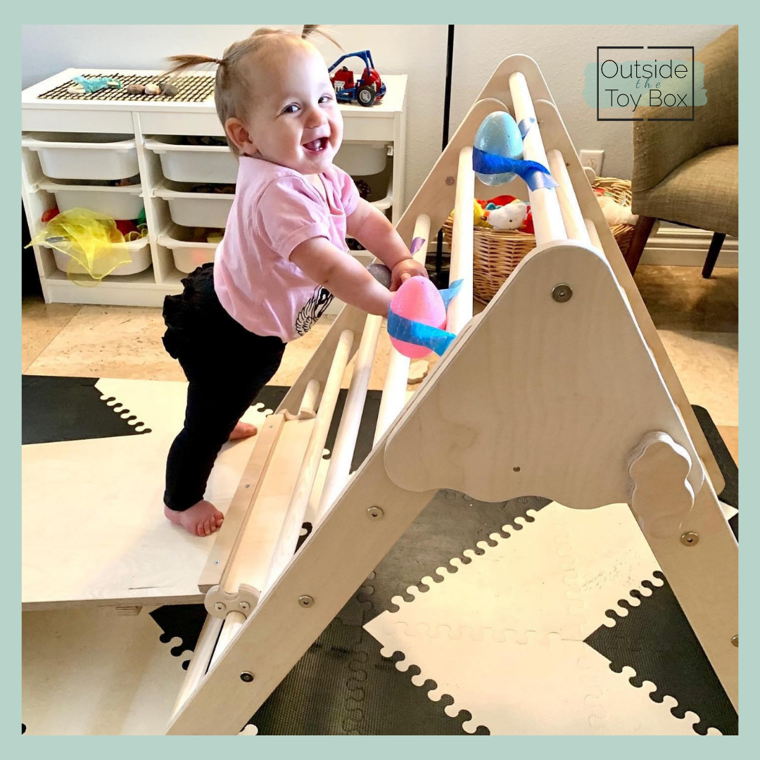 How To Use The Pikler Triangle Besides Climbing - Outside The Toy Box