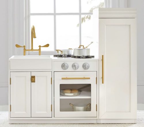 White and gold play kitchen