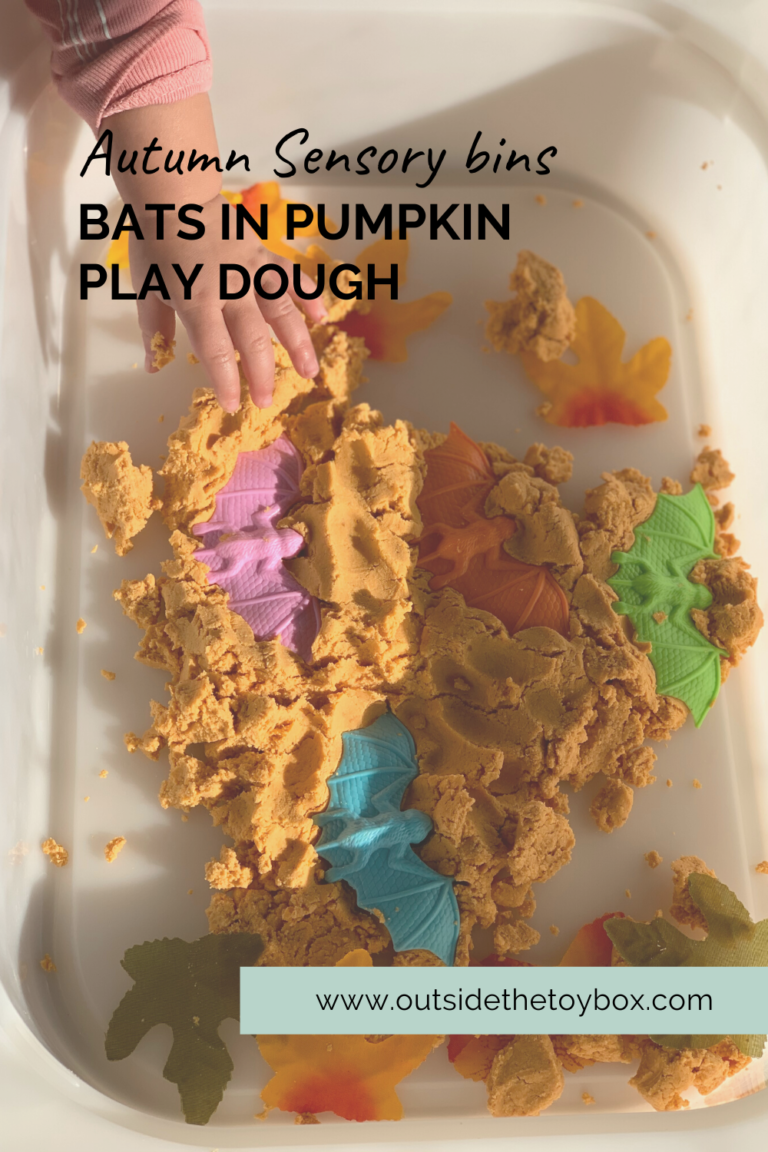 Colorful bats in orange play dough
