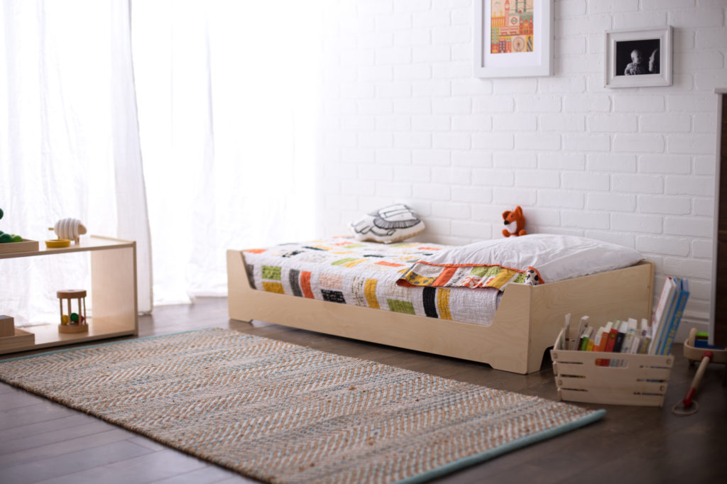 Wooden floor bed in room