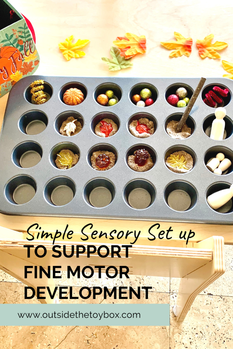 kinetic sand and autumn loose parts in a mini muffin tin